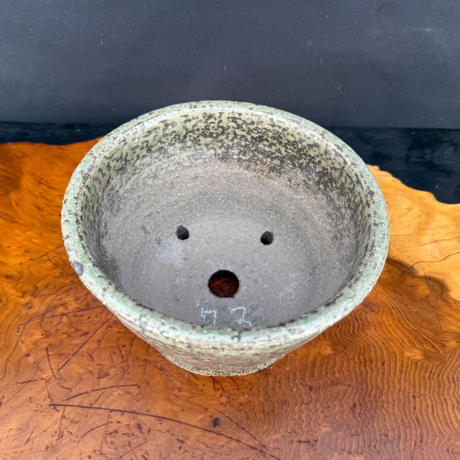 Top view of Shuho handmade speckled glazed bonsai pot with drainage and wire holes