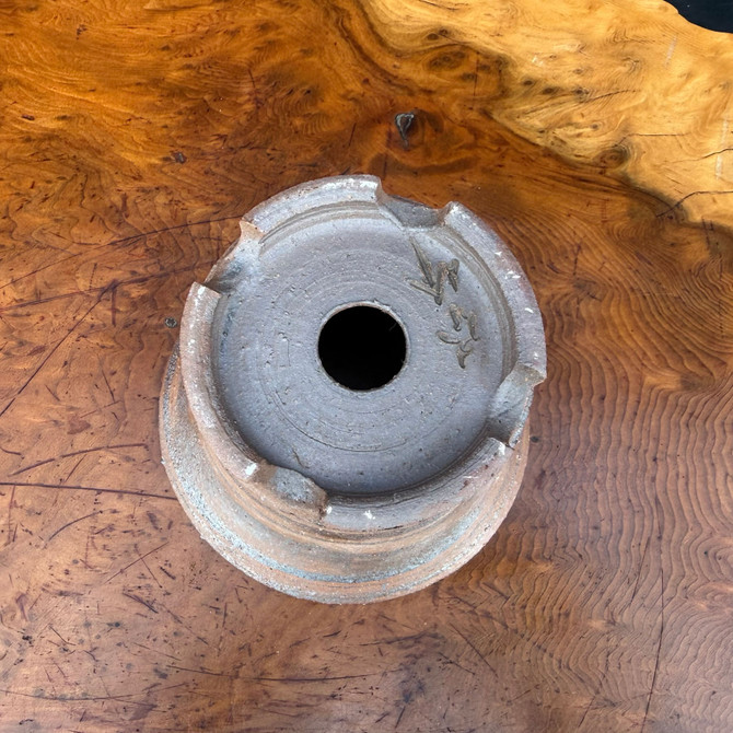 Bottom view of Shuho handmade bonsai pot showing feet, drainage hole, and artist chop