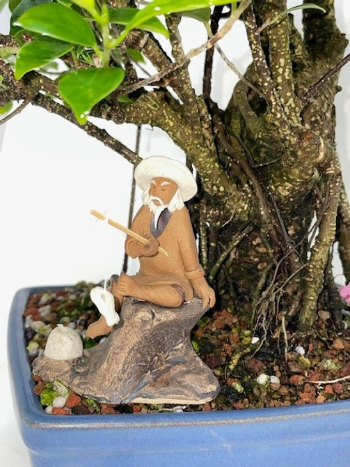 Chinese Figurine - Man Sitting Fishing off of a Rock (F-067)