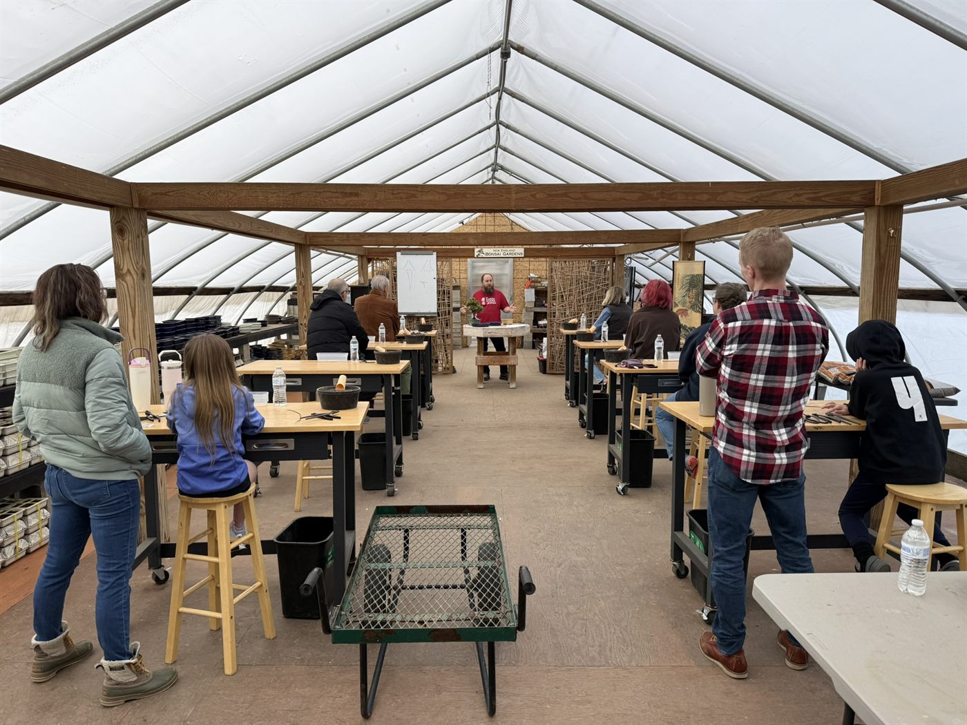 Jamie Prevosk leading a bonsai workshop in the greenhouse classroom