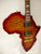 Instruments of Africa Lagos Carved African Landscape w/Tweed HSC, Mahogany body and neck,Quilted Maple Top, Maple RW fingerboard