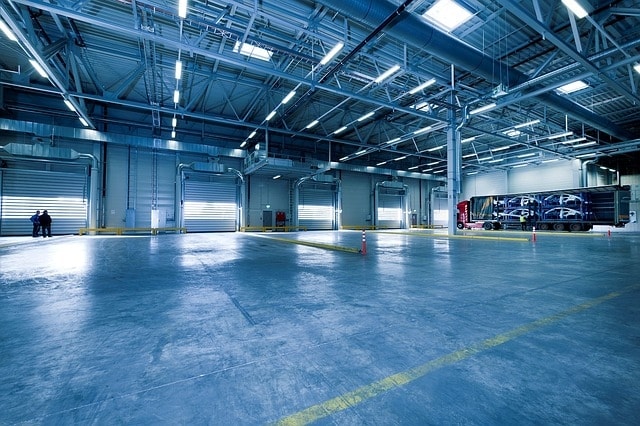 An empty warehouse the houses trucks with fleet safety cameras