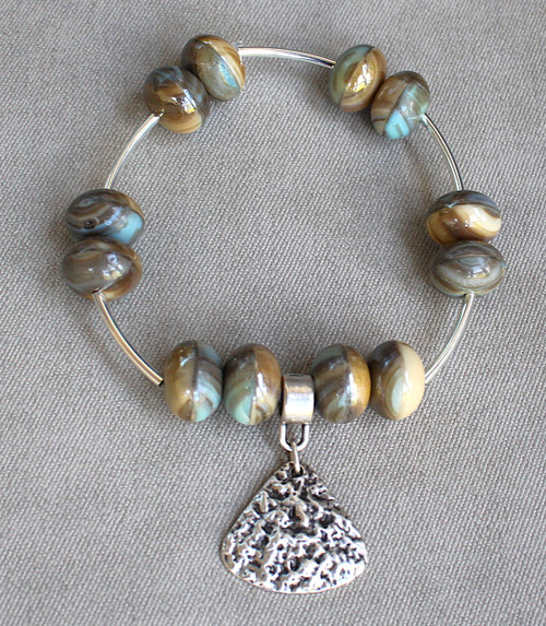 Earthy Beaded Bracelet with Textured Silver Charm