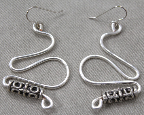 Hand‑Formed  Wire Earrings with Etched Tribal Beads