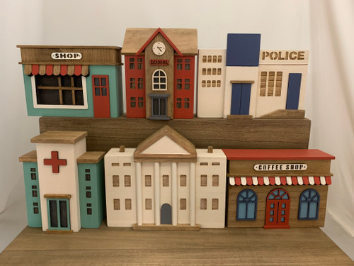 There are 6 buildings in this set. We do not sell them individually. 
The largest building is the council building (the white one in the front) 24x6.5x20cm, the smallest ones are the hospital and the school 15.5x7x19.