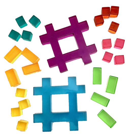 The Lucite Hashtag sets have 2 Hashtags (the exact same size as our wood ones) and 16 cubes and 8 5cm rods.
It is recommended not to play on a hard surface with these, like concrete. The best place is a table top or on the floor, wood or carpet. These items are fully tested and compliant but may chip if dropped on a hard surface.