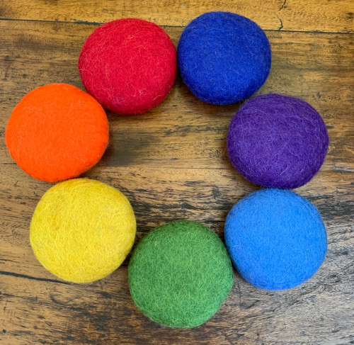 The Felt Balls are designed to work with our new Shapes sets.

It contains 7 Felt Balls, one in each of our Rainbow colours and this will match back to any of the other Rainbow products that we do.