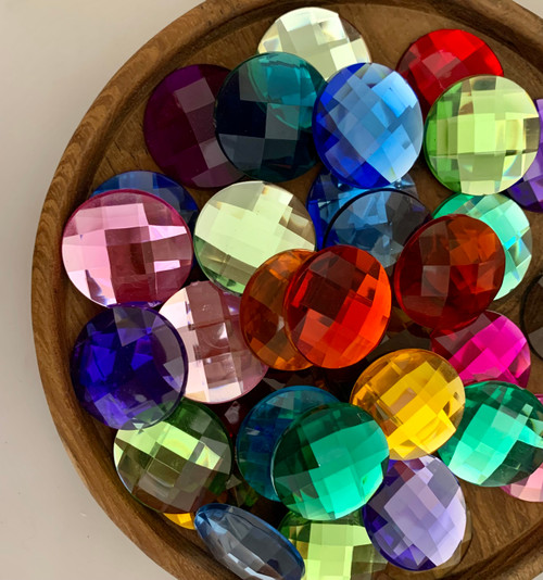 Wooden Bowl not included. mixed gem set, 25 colours, 2 of each. Colours may vary from set to set depending on availability.
The gems are 30mm diameter.