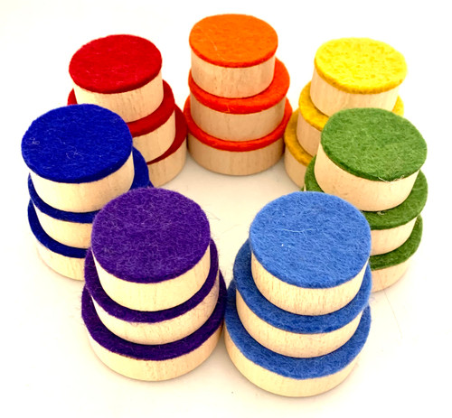 The wood disk have been 'felted' on one side, giving these blocks an extra sensory texture. They match all our rainbow products, there are 3 sizes of discs in each colour.