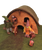 The gnome house set include the gnome house with roof, a wooden hand carved dog, cat and chicken and two gnomes and the play mat it sits on.