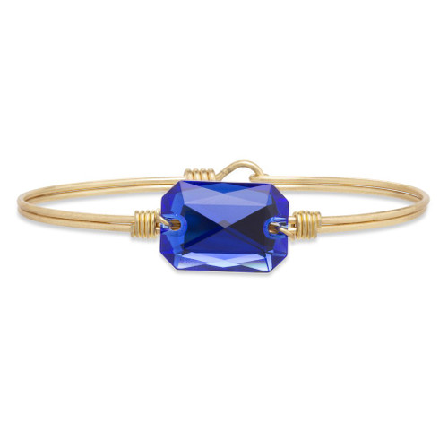 Petite Dylan Brass Tone Bangle Bracelet in Majestic Blue by Luca and Danni