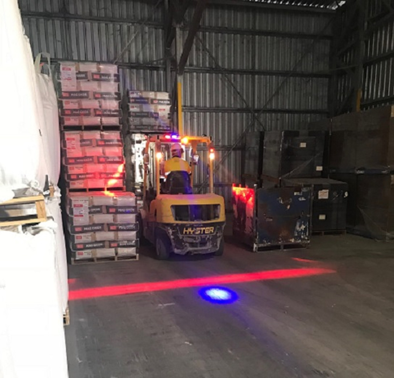 Sibelco storage warehouse in the Nth Queensland area, forklifts fitted with our Safety Halo Systems. Ultimate LED Australia