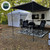 HD Nomadic 90 Degree Awning - Grey Body, Green Trim & Black Travel Cover Lifestyle