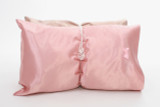 Pearl Collection features our top-of-the-line satin pillowcases. Same eco-friendly satin body adorned with a miniature pearl in the center of a matching satin bow. Lush, hydrating and anti-absorbent. Lock in moisture overnight. Two enchanting colors: (pink) Petal Pusher and( taupe) St. Tropez. 