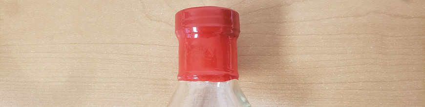 How to Apply a Shrink Band to a Bottle