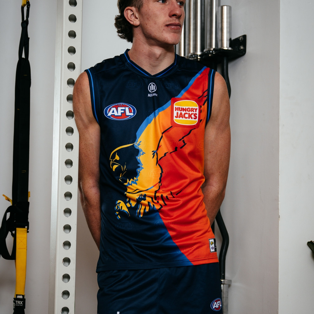 West Coast Eagles New Balance Youth Short Sleeve Gather Round Guernsey Ochre (2026) (Updating)