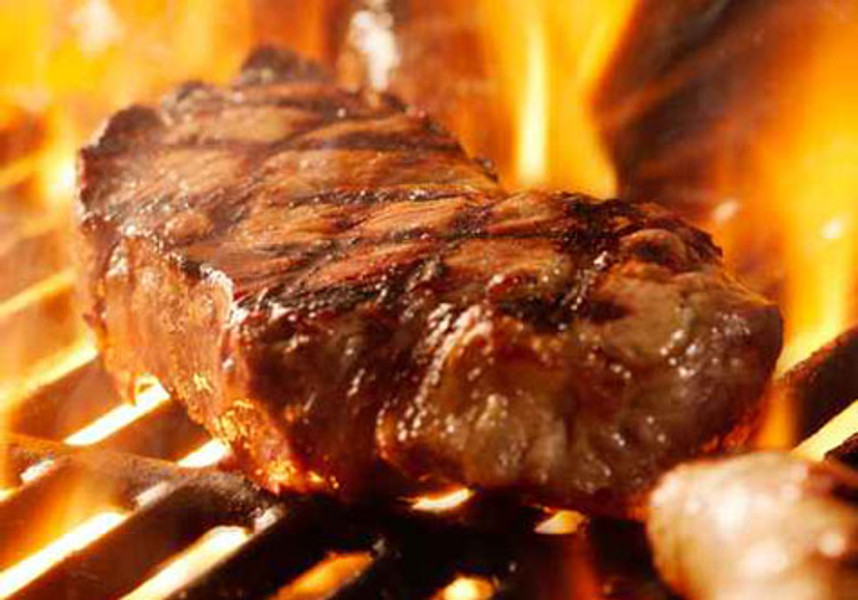 Bison Meat Grilling on the BBQ Bison Meat Grilling on the BBQ