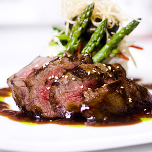 bison filet mignon with asparagus and sauce