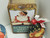 Collection of 3 Christmas Santa's from Coca Cola, Daher and Norman Rockwell