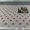 Stitch Block Flame Outdoor Upholstery Fabric by Sunbrella