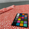 Puff Dotty Coral Upholstery Fabric by P. Kaufmann