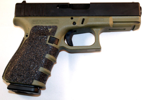 Glock 23 used chambered in 40 S&W with a OD Green frame w/ grip tape