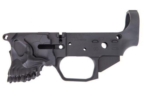 This is a factory Spike's Tactical AR-15 billet lower receiver. Called the "The Jack" this lower has a unique theme, that features a three dimensional skull as the magazine well.