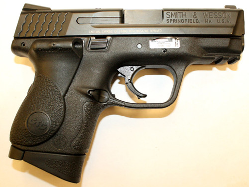 M&P compact .40sw, pre-owned. Manufactured by Smith & Wesson. Comes with (1) 10 round magazine and a Crimson Trace Grip Laser.