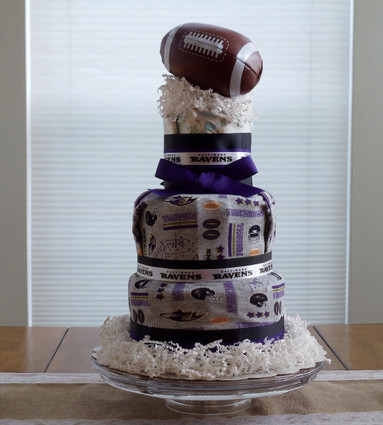 purple and gold diaper cake
