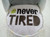 #Never Tired Bassinet Diaper Cake - bib with #never Tired written on it