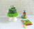 Green Dino Bundt Diaper Cake - front side