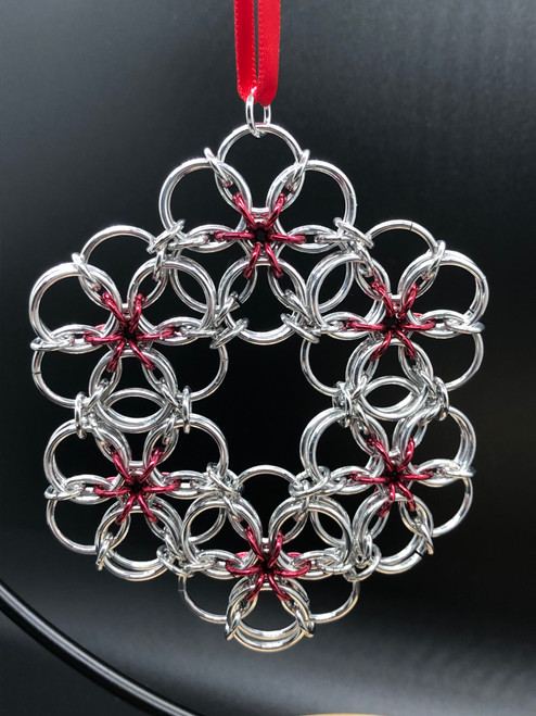 This kit contains material to create one Christmas ornament.