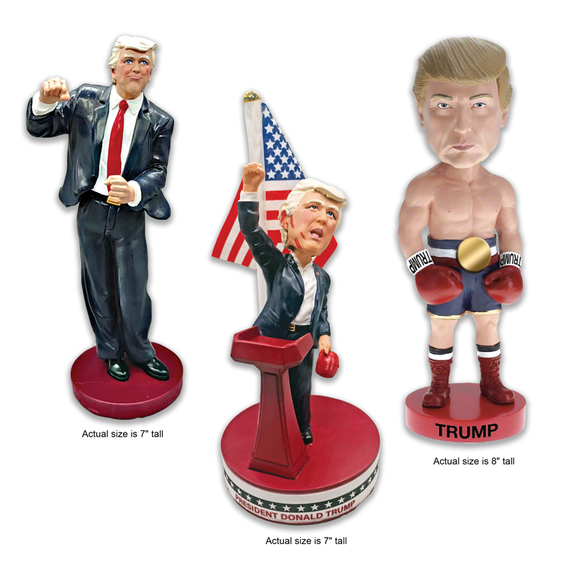 A  picture of the 3 pc Ultimate Trump Bobblehead Set