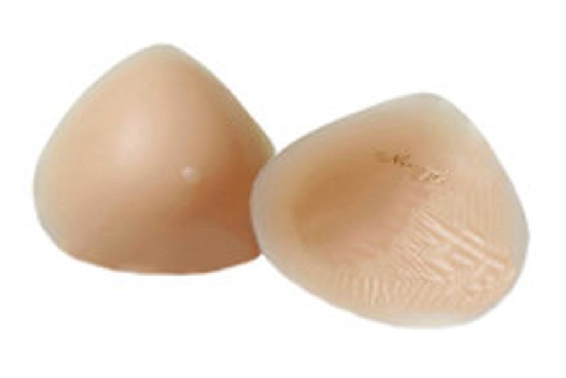 The breast form store.  Transform - Breast Form with Nipple | Standard Weight Modified Triangle Silicone #860 made in the USA transgender fake boob