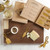 Santa Barbara Design Studio Cardboard Book Champagne Gold Cheese Knives Box Set