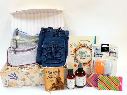 World Travel Gift Basket for women features  travel crossbody bag, set of 3 travel pouches, and so much more.