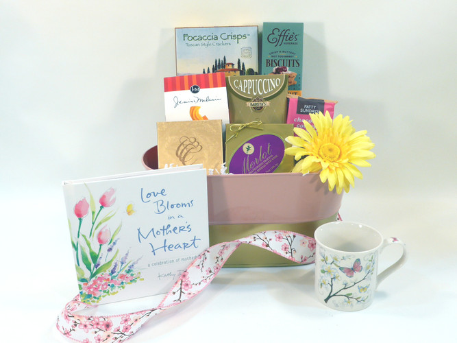 Mother's Day thank you gift features assorted gourmet snacks, with special mug and book for Mom