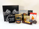 Elegant Gourmet Gift Box for Men includes stainless steel flask and assorted gourmet snacks.