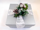 Beautifully packaged in silver gift box with holiday ribbon and decor.