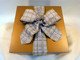 This delicious gift box elegantly packaged in a gold gift box with hand tied bow.