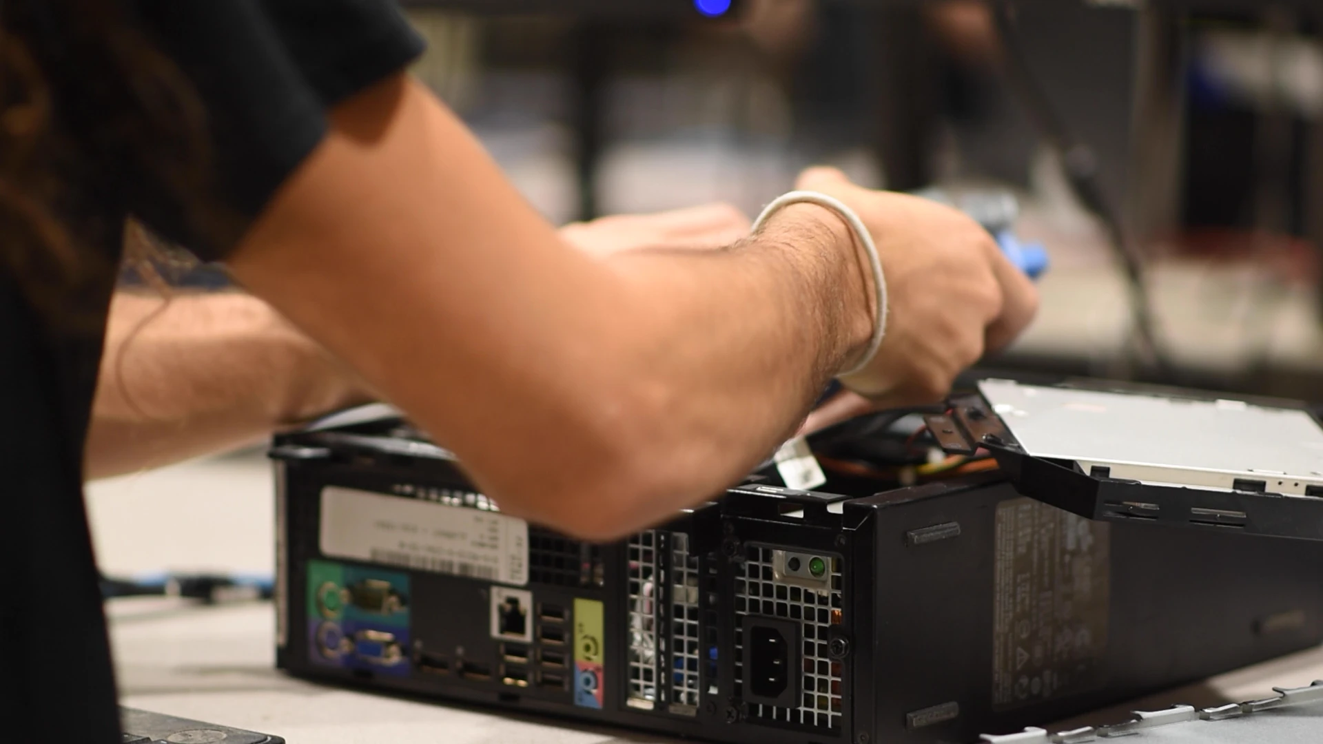 BlairTech team member repairing computer