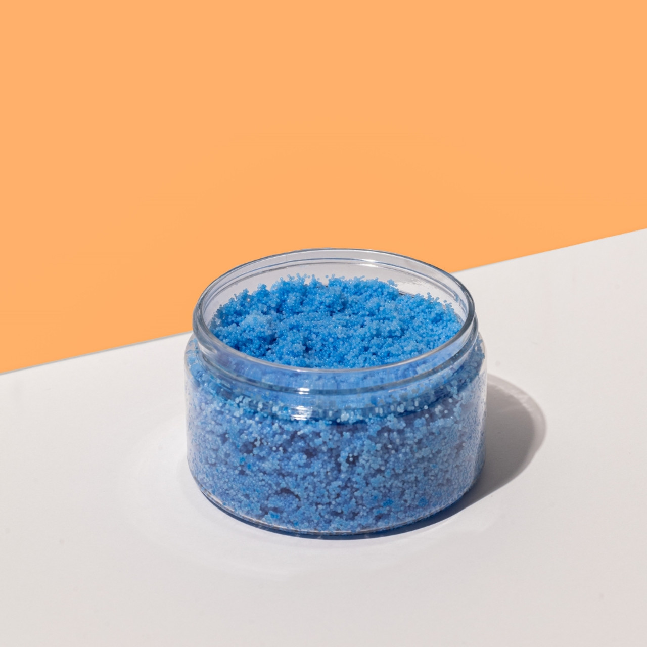 Blue and white granulated wax crystals to create candles by