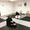 grappling mats in use