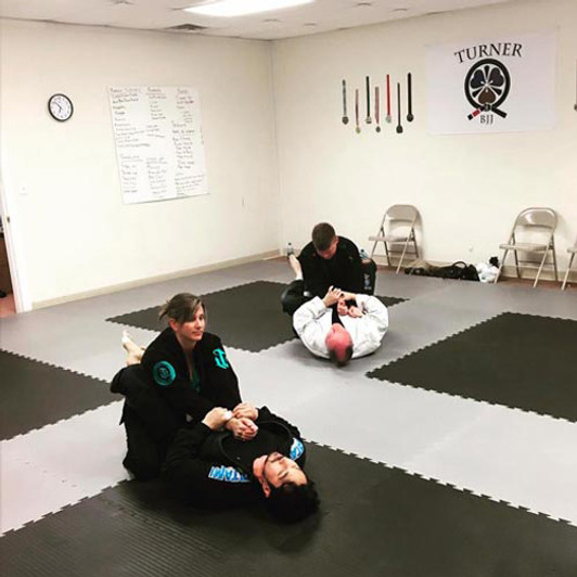 grappling mats in use
