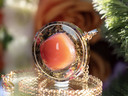 Close-up of I AM Fire pendant featuring AAA Carnelian set in gold inset ring