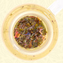 Steeped Spring Blossom white tea leaves and flower petals viewed from above