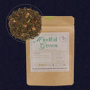 Mindful Green premium loose-leaf green tea with Chinese sencha and natural vanilla bean pieces in Tea Phases packaging.