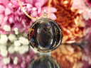 AAA Hypersthene tea-infused pendant handcrafted with Goddess Grey tea and a gold inset ring by Tea Phases.