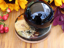 Botanical candle holder used as a crystal sphere stand with pressed flowers, Pyrite, Shungite and natural cork base.