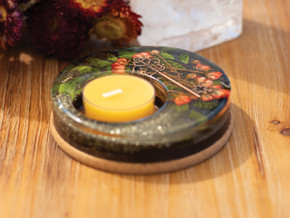 Angeled view of the Dark Secret Garden Candle Holder with a beeswax tealight, featuring pressed roses, pyrite shimmer, and a copper key embedded in resin. Angeled view of the Dark Secret Garden Candle Holder with a beeswax tealight, featuring pressed roses, pyrite shimmer, and a copper key embedded in resin.